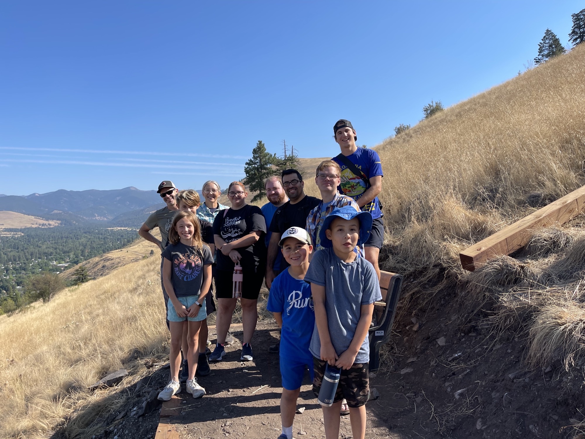 Grads, faculty, & kids hike the M